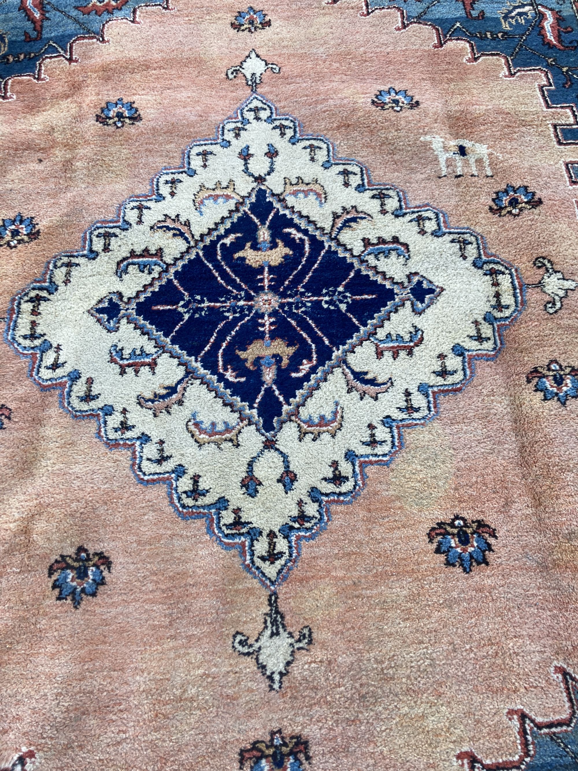 A Persian Shah-Savan carpet, 331 x 268cm